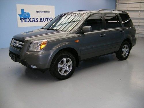 We finance!!!  2007 honda pilot ex-l auto roof nav rcam 3rd row 6 cd 1 own 22k