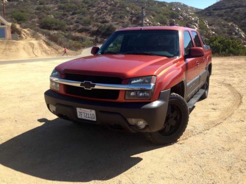 2003 chevrolet avalanche 1500 z71 crew cab pickup 4-door 5.3l 4x4 orange