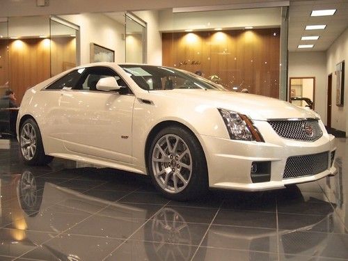 '12 cts v one owner showroom condition only 12,740 miles ebony saffron interior