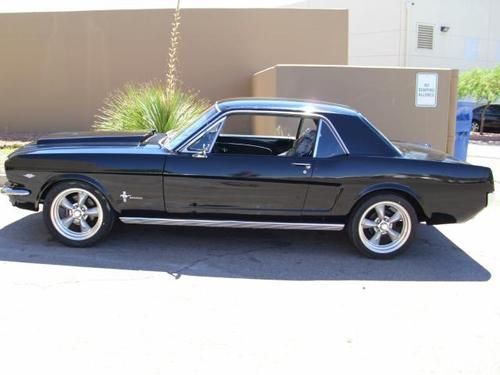 Raven black on black 1965 (1964 1/2) mustang