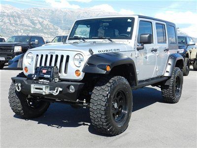 Jeep 4 door unlimited rubicon hardtop auto custom lift wheels tires winch tow