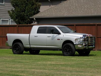 Mega cab ( leather seats ) rims! nice truck 69k