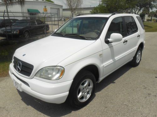 2000 mercedes ml320 leather moonroof 3rd rowseats  headed seats  awd  roof-rack