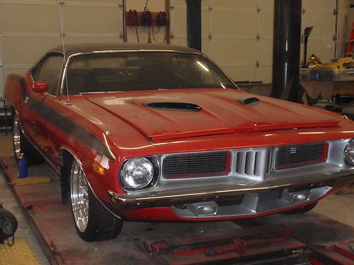 1972 cuda red w/  black stripe w/ 340 motor been sitting in shop for years