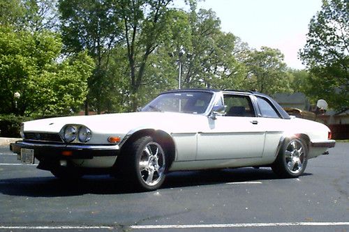 Heavily modified xj-sc (produced for only 3 years) targa top with hard/soft back