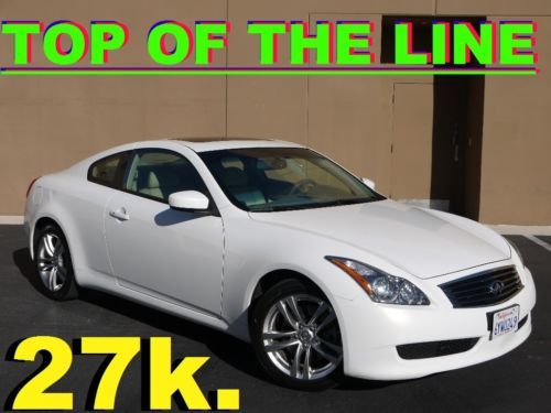 2009 infiniti g37 journey only 27k. white pearl top of the line no reserve