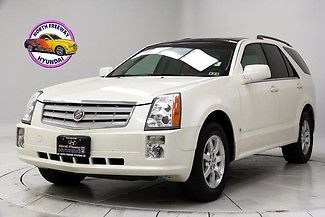 Ultra view sunroof power adjustable pedals heated seats leather seats