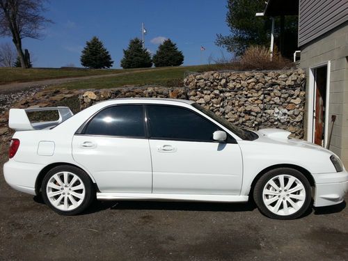 White 2004 subaru sti, runs very strong