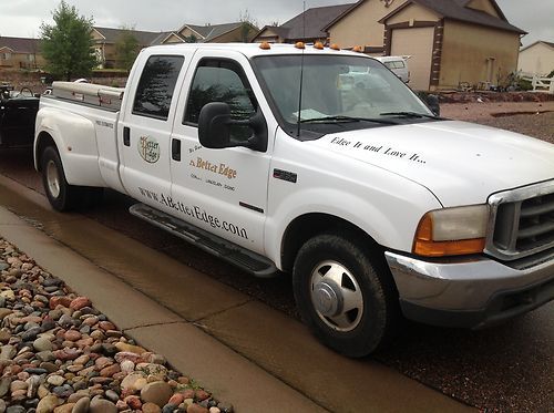 1999 f-350 super duty  white crew cab lariat 7.3l diesel dually. 5th wheel, tow