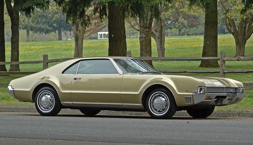 - exceptional '67 olds toronado in florentine gold - rare bucket seat option -