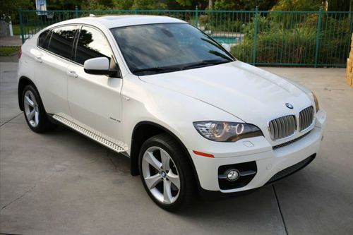 2009 bmw x6 xdrive50i white w/ red 49,500 miles