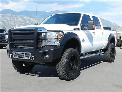 Ford crew cab lariat 4x4 powerstroke diesel custom new lift wheels tires bumpers