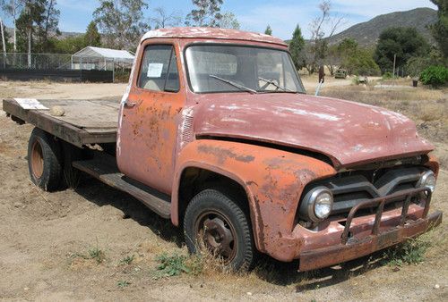 1955 ford truck, primer red.