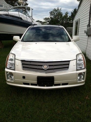 04 cadillac srx v8, navigation, pwr 3rd row, dvd, salvage title