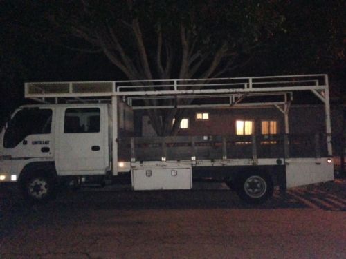 Isuzu npr crew cab, seats a 7 person work crew, diesel engine