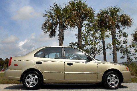 Gl 1.6l sedan~automatic~desert sand paint~30 mpg's~save~fl car~03 04 05 06 07