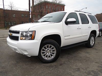 White lt,4x4,72k miles,3rd row,boards,tow pkg,ex-govt,alum rims,new tires