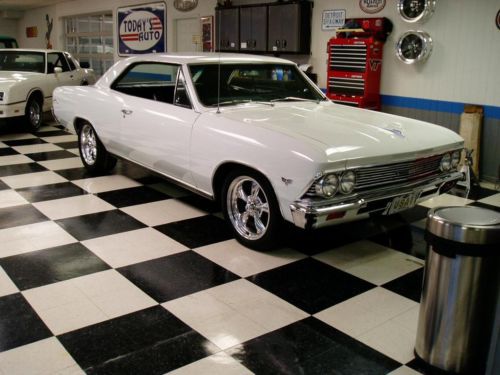 1966 chevrolet malibu. numbers match. 4 speed. a/c. frame off restored.