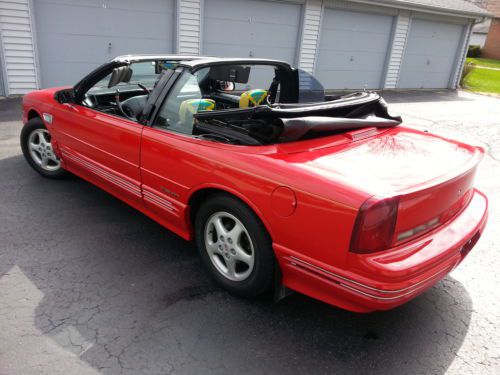 Red cutlass supreme convertible