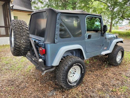 2003 jeep wrangler sport 4.0 4wd lifted and modified with winch!