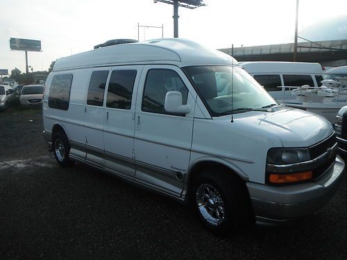 06 chevrolet express explorer limited 9 passenger dvd 6 captain chairs sat tv