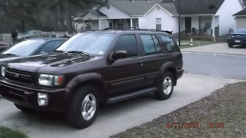 Burgandy infiniti with leather seats and sunroof top.  fully loaded