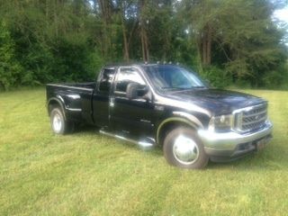 Black ford f-250 2002 7.3 liter diesel powerstroke dually