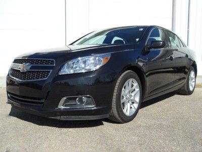 Chevy eco malibu black low miles  excellent condition garage kept we finance!!!