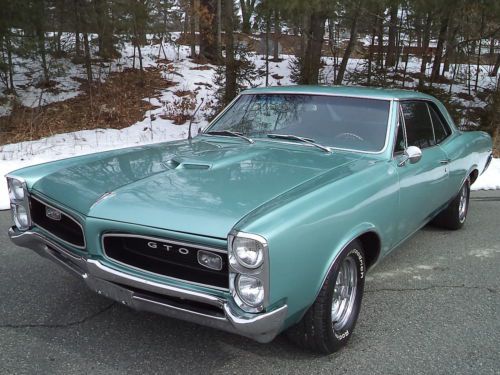 1966 pontiac gto 389 tri-power 4 speed reef turuoise exterior with turquoise int