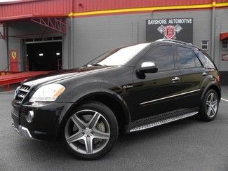 Ml63*amg*black/black*rear ent*21"wheels*carfax cert*1 owner*h/k*books*we finance