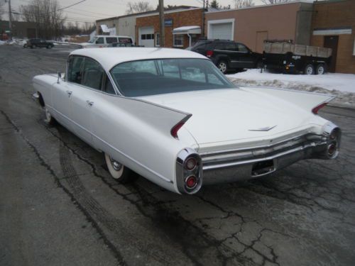 1960 cadillac deville.. older frame off restoration, 1959 caps look!!