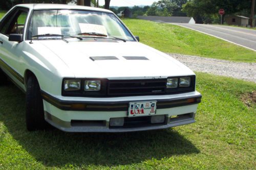 1984 mercury capri rs 5.0,5 speed, 4 bbl.carb.hatchback (3door) white