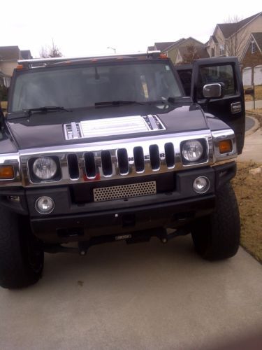 H2 hummer black on tan leather with customized masonia marble wood  dashboard