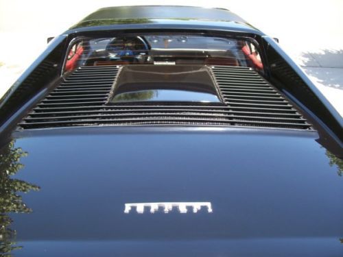 Ferrari 308 gtsi black on black/red interior