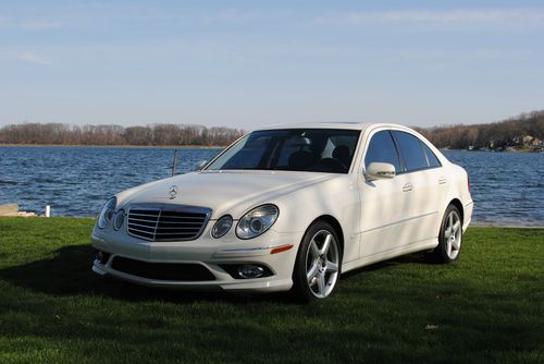 Beautiful 2009 mercedes benz e350 4matic amg sport white on black like new