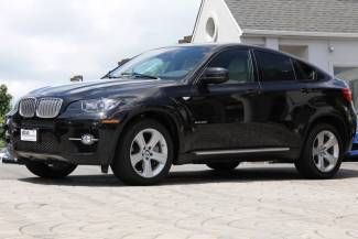 Black sapphire metallic auto awd msrp $80k only 2,561 miles loaded with options