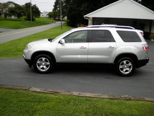 2009 gmc acadia slt awd on star xm etc.3rd row low low reseave great shape