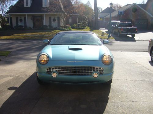 Thunderbird blue, one owner, 28,000 miles