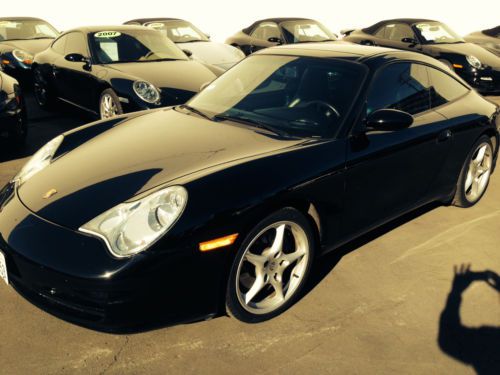 Porsche 911 black, targa 2004 with 55k miles.