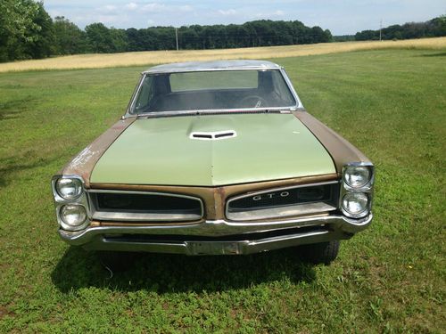 66 gto tripower 4 speed burgundy/black