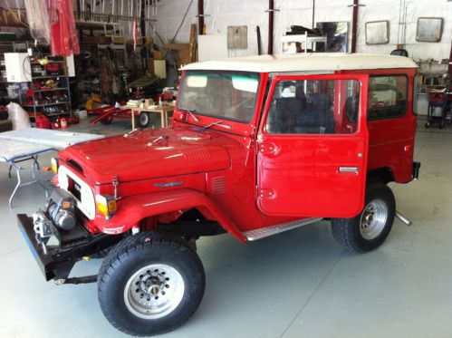 10 year restoration fj-40 landcruiser, free born red, 4wd, 4 sp, winch nice!