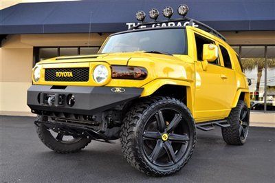 2007 toyota fj cruiser  4.0l v6,6-spd trans,22"cec wheels,one-off sound sys,nav!