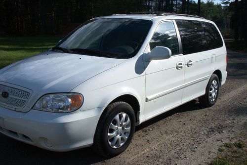 2004 kia sedona lx minivan, white, 3rd. row seat