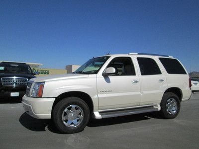 2005 awd white v8 leather navigation sunroof miles:41k 3rd row