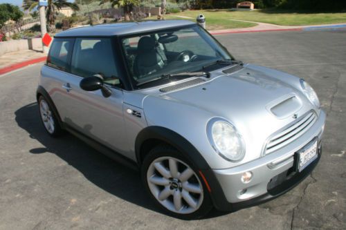 Supercharged silver, black leather interior