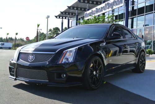 1 owner  custom wheels, exhaust cts-v sedan.