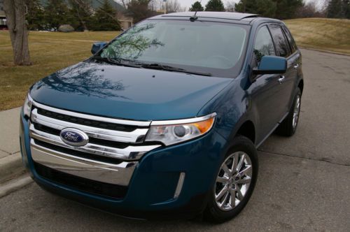 2011 ford edge, leather, panroof, backup camera, rebuilt, warranty.