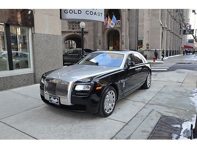 2013 rolls royce ghost.  diamond black with silver two-tone.  seashell.