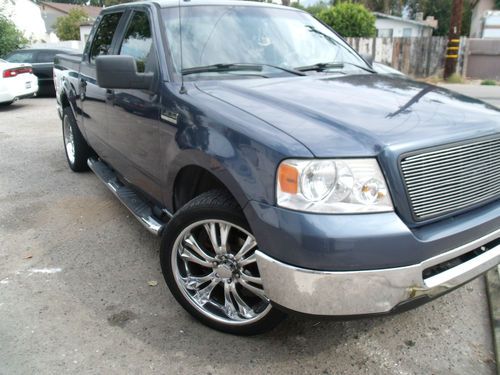 2006 ford f-150 xlt crew cab pickup 4-door 5.4l, gps, dvd rear tv, 22' rims