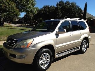 2005 lexus gx470 awd!clean carfax,new tires,rear ent,heated seats,runing board